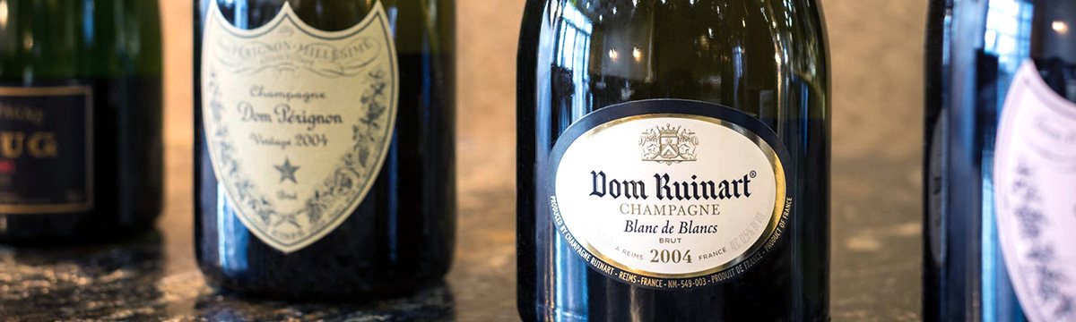 Champagne bottles displayed for service